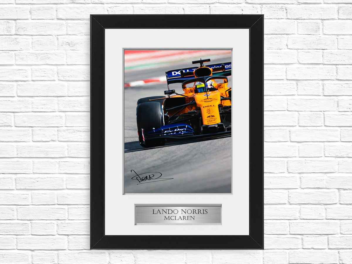Lando Norris McLaren Formula 1 2021 Car framed print by LJW Prints