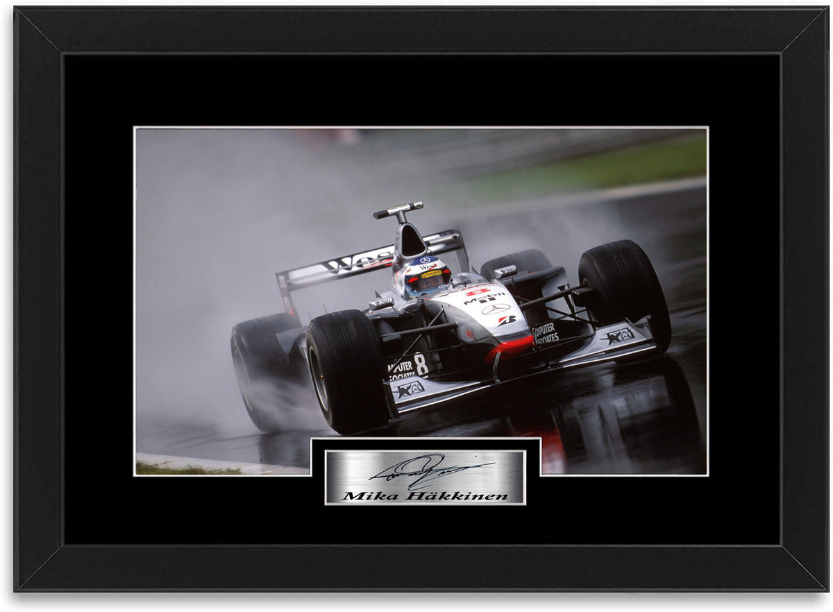 Mika Hakkinen F1 World Champion 1998 framed print by LJW Prints